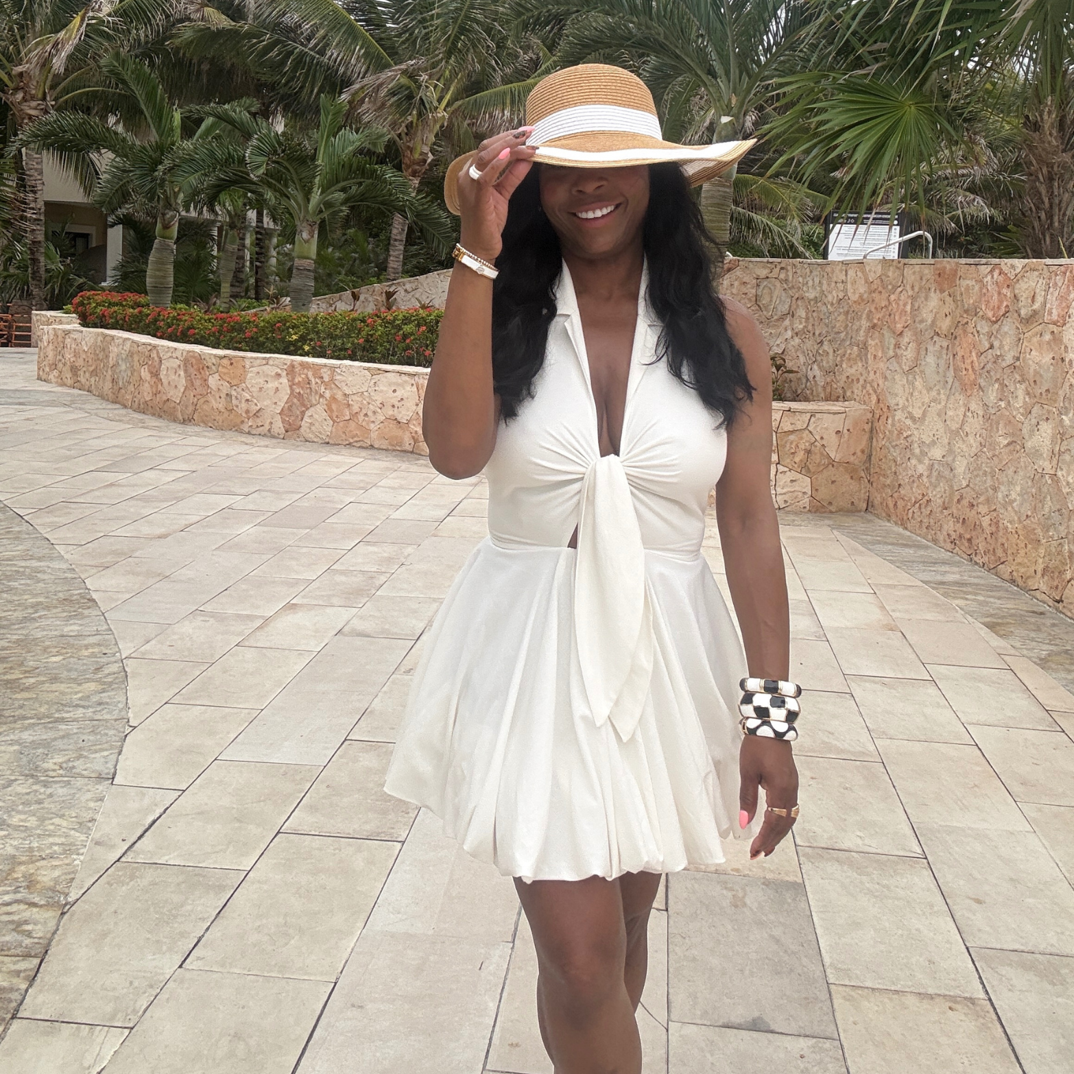 Woman in a white Bubble Hem dress on vacation