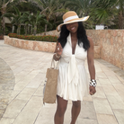 Woman in a white Bubble Hem dress on vacation 