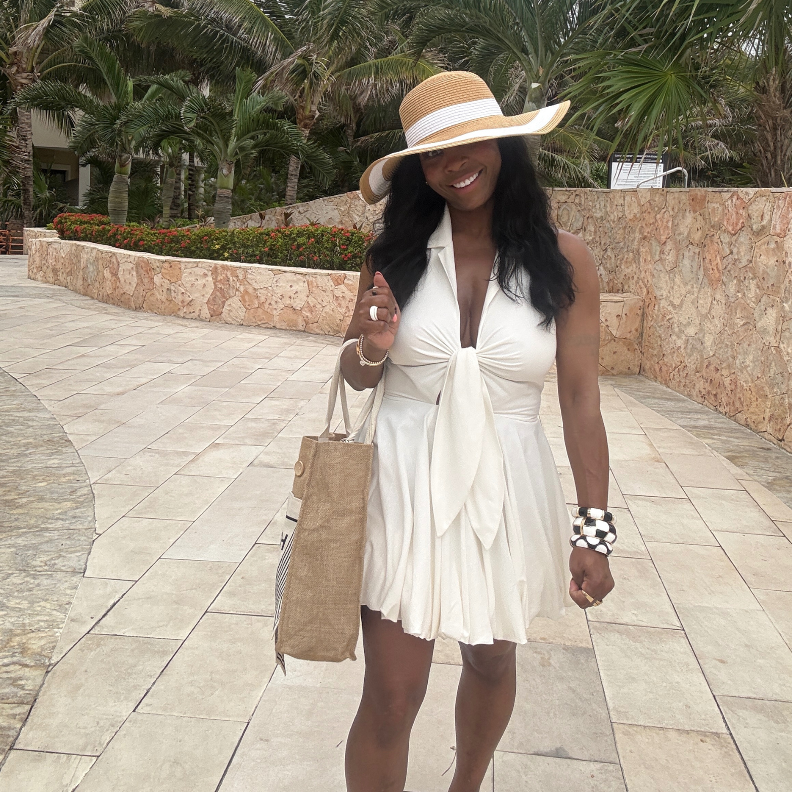 Woman in a white Bubble Hem dress on vacation 